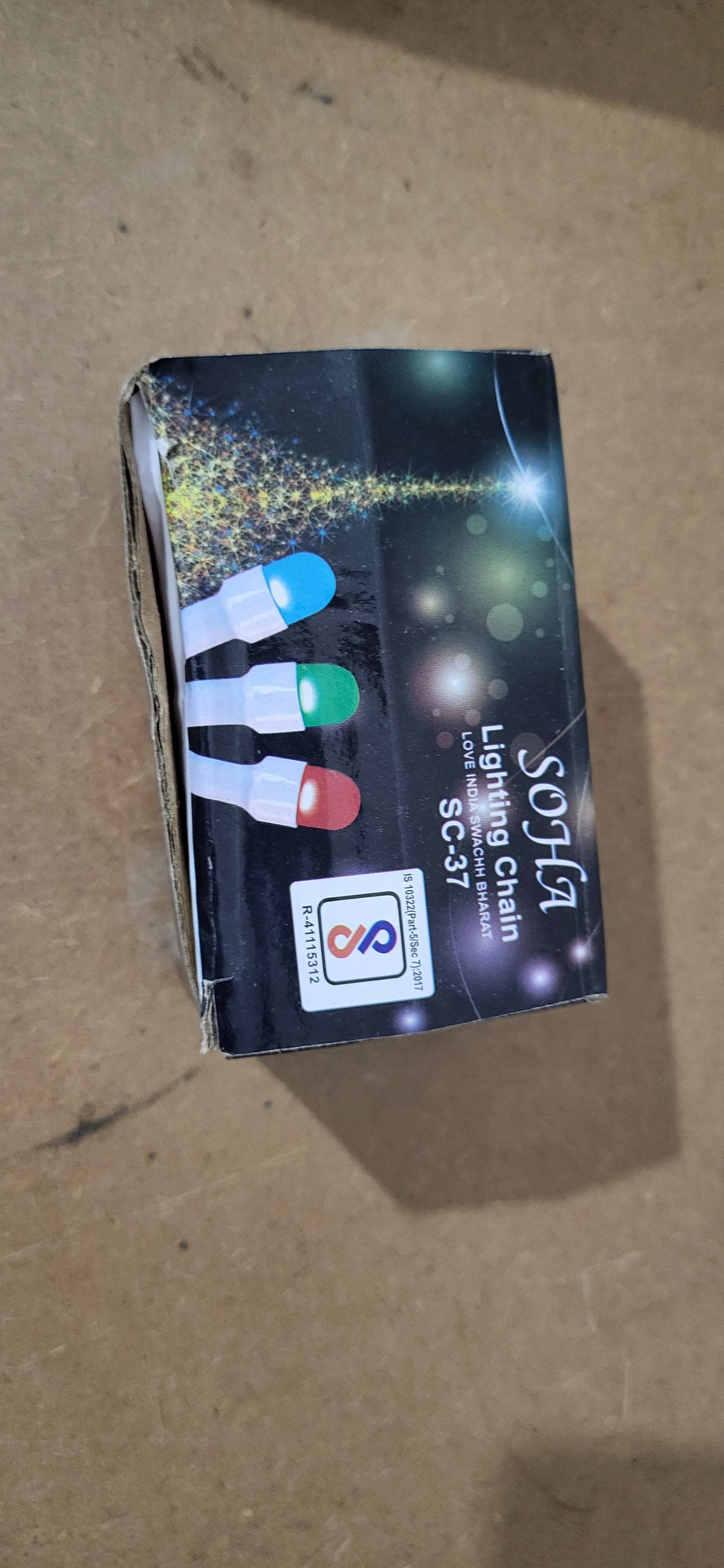 Box of SOHA Lighting Chain on a cardboard background